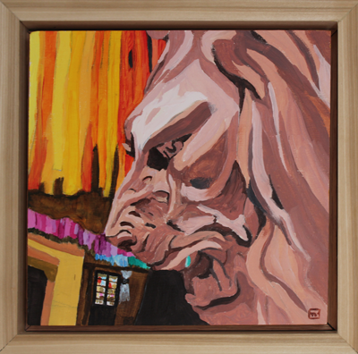 Large stone lion in front of multi colored ribbons and stone building behind