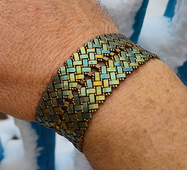 Hand beaded cuff with traditional native American design