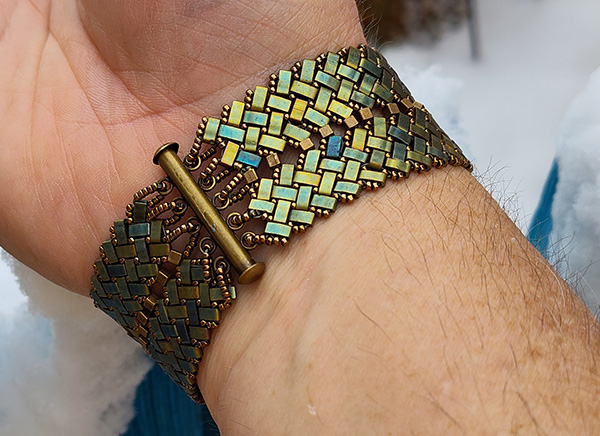 Hand beaded cuff with traditional native American design