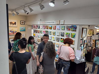 group of people ooking at art