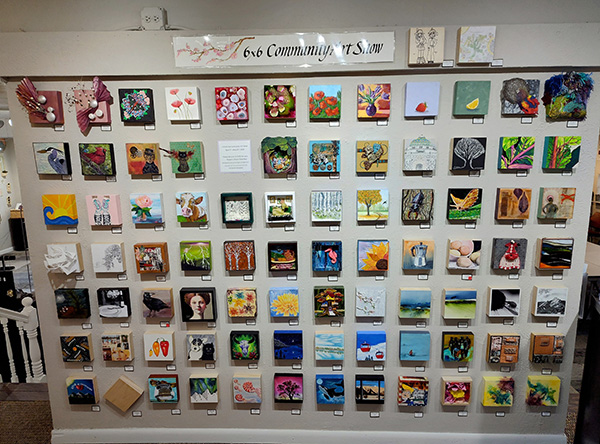 Wall full of 6"x6" paintings