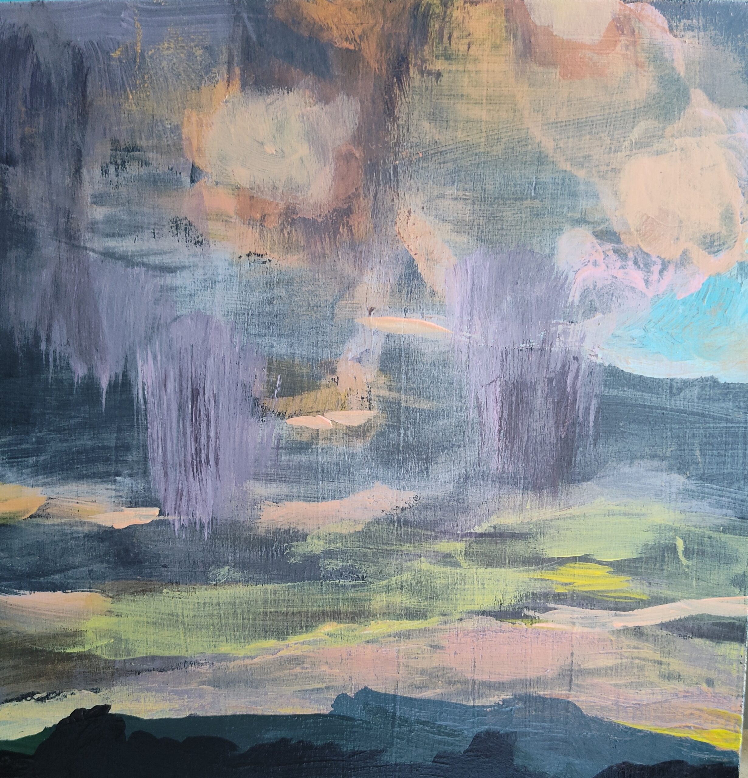 Purple storm clouds over a landscape